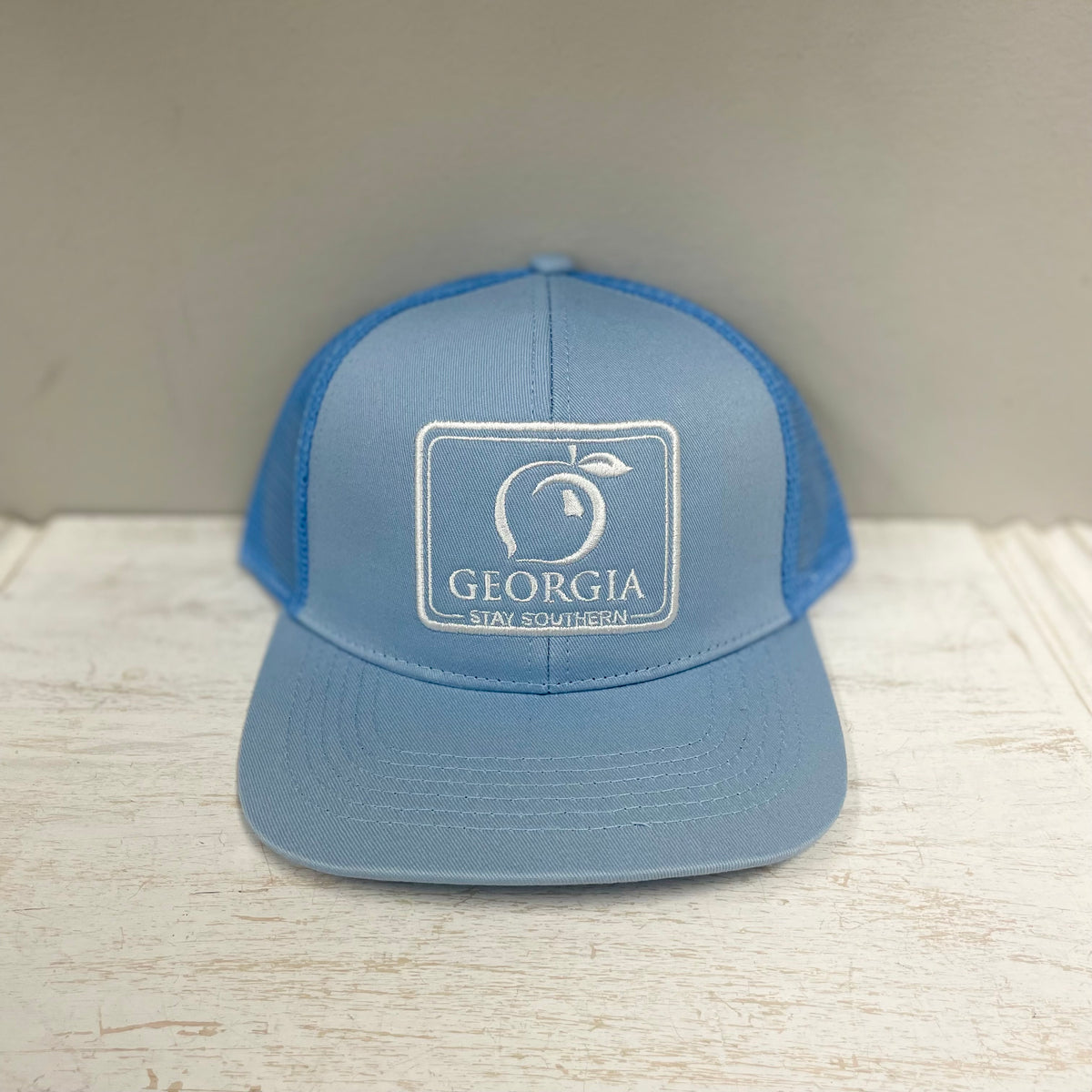 The Georgia Mesh Back Trucker Hat • Sky Blue